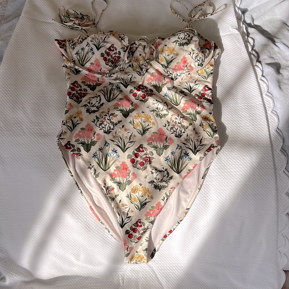 “ Agua Bendita”One piece bathing suit . In brand new condition worn once